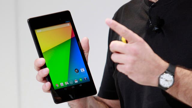 Hugo Barra, director of Product Management at Android, holds the new Nexus 7 tablet during a Google event at Dogpatch Studio in San Francisco, California.