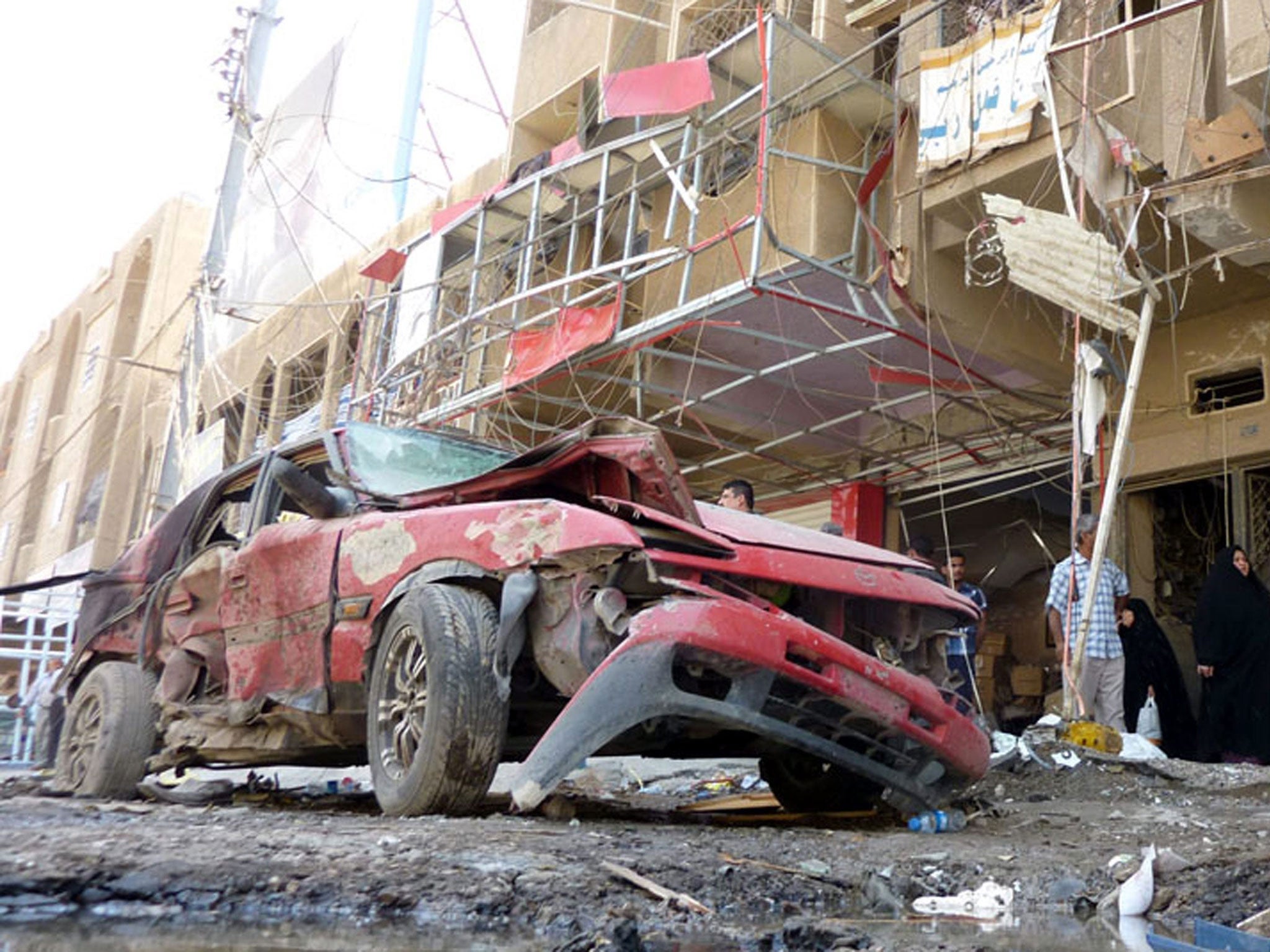 The scene of a car bomb attack in northern Baghdad