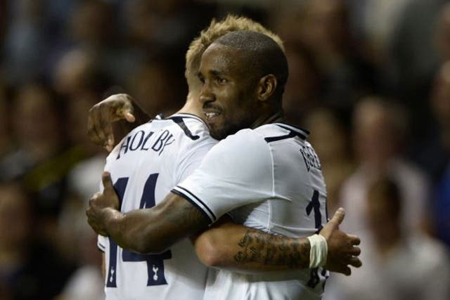 Jermain Defoe (right) celebrates scoring for Spurs last night 