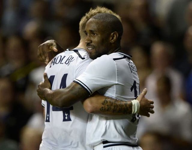 Jermain Defoe (right) celebrates scoring for Spurs last night 
