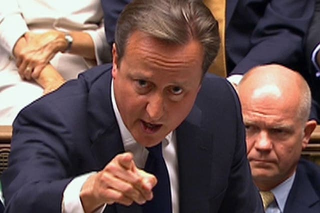 David Cameron is seen addressing the House of Commons during the vote for intervention in Syria