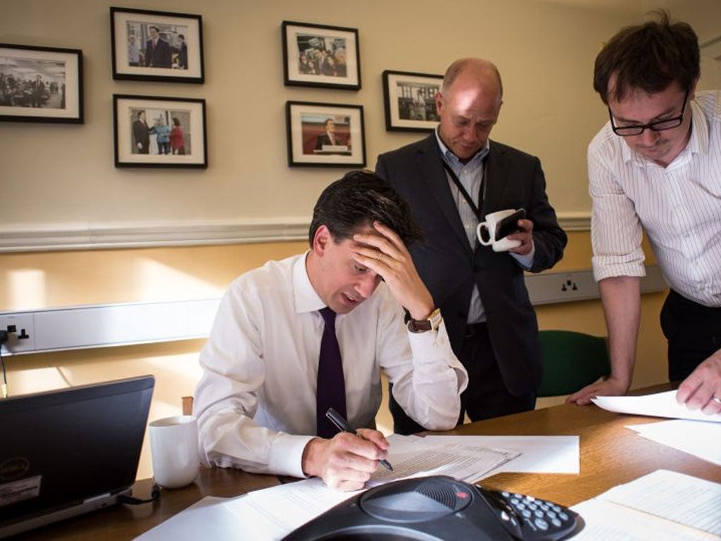 Ed Miliband, seated, on Friday