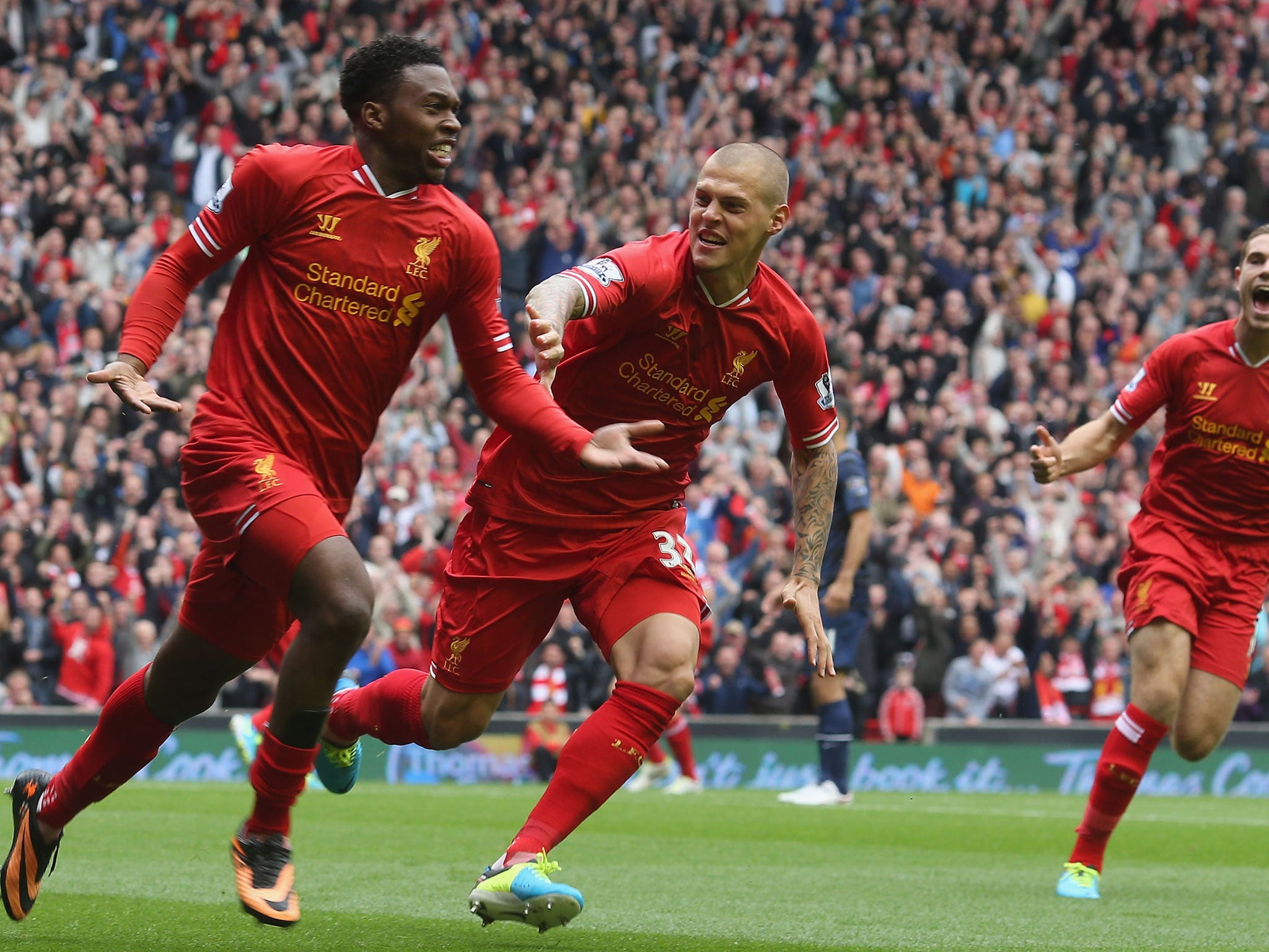 Daniel Sturridge of Liverpool (L) celebrates scoring their first goal