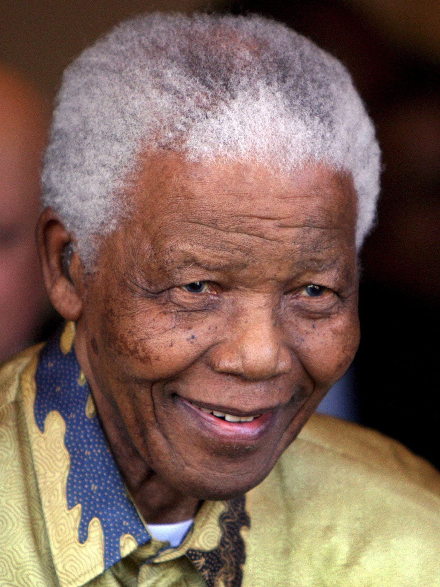 Nelson Mandela is said to be doing 'fine' as he recovers at home