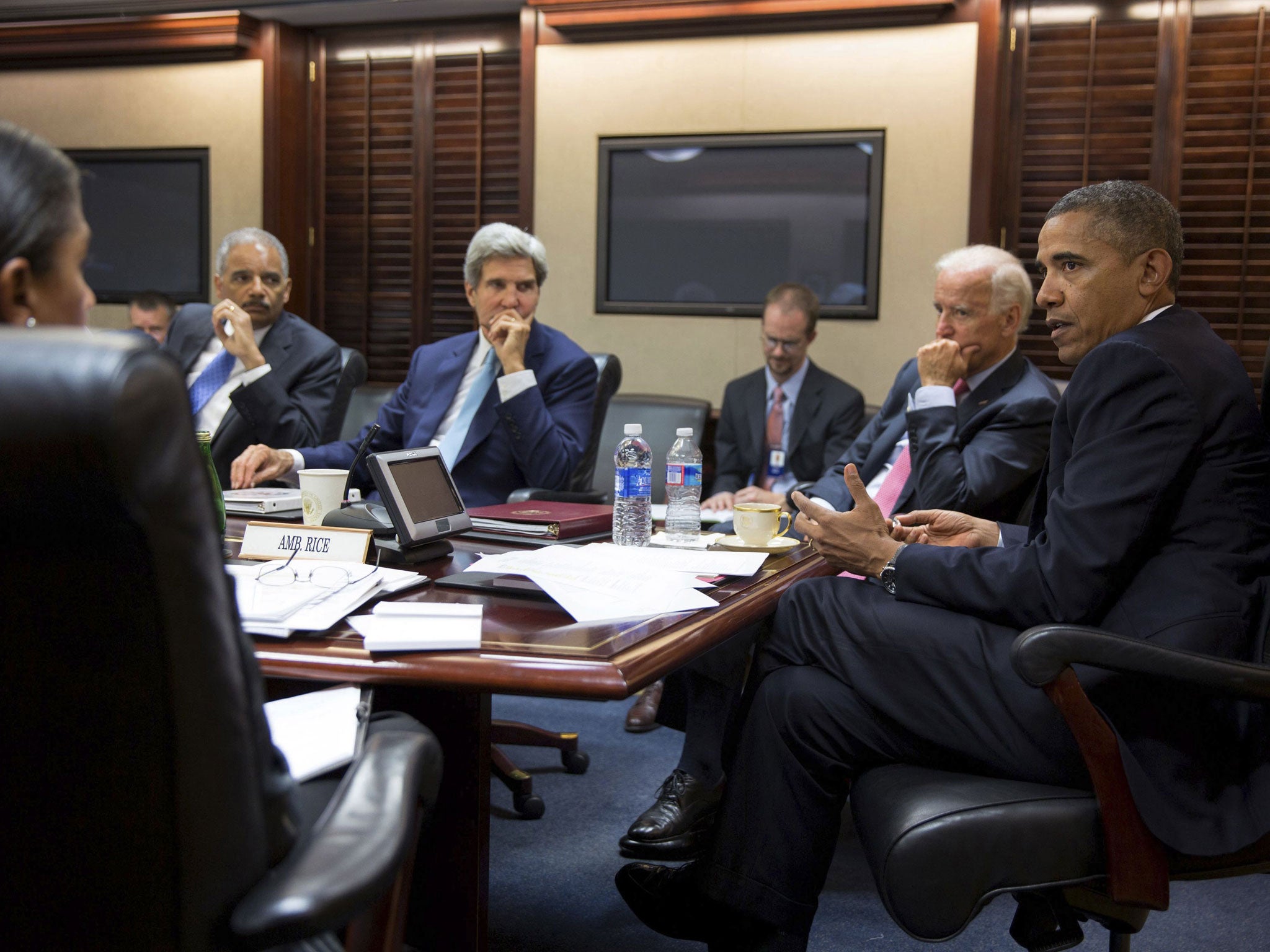 Barack Obama meets with his national security staff to discuss the situation in Syria in the Situation Room of the White House