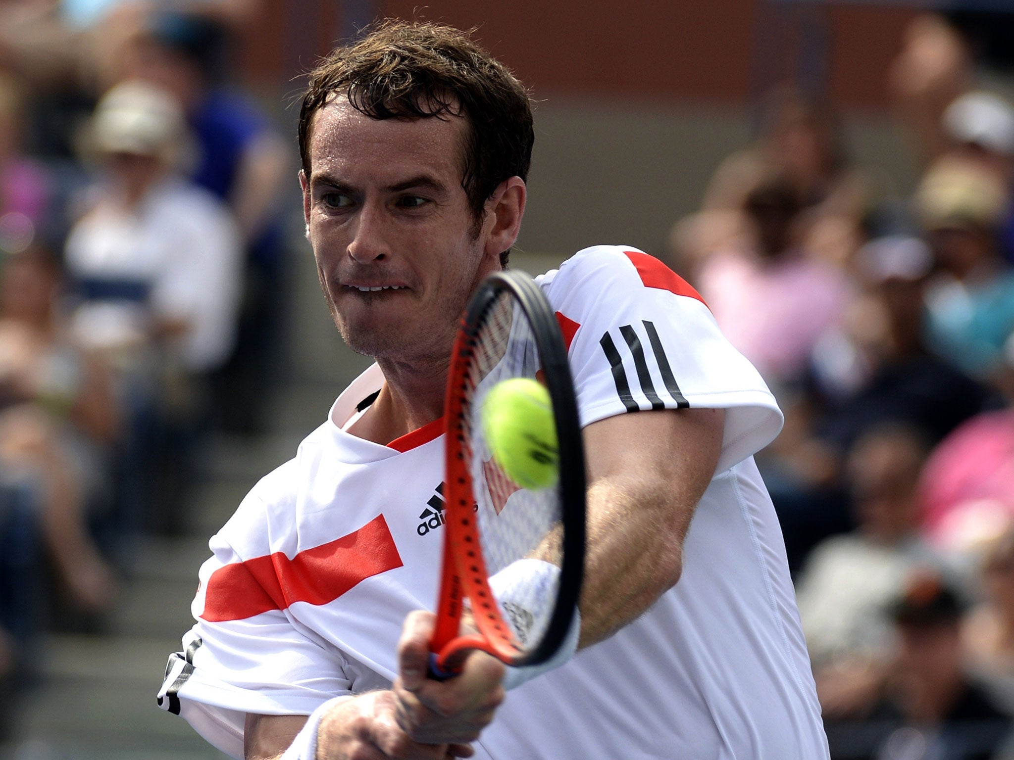 Andy Murray hits a return during his win over Florian Mayer