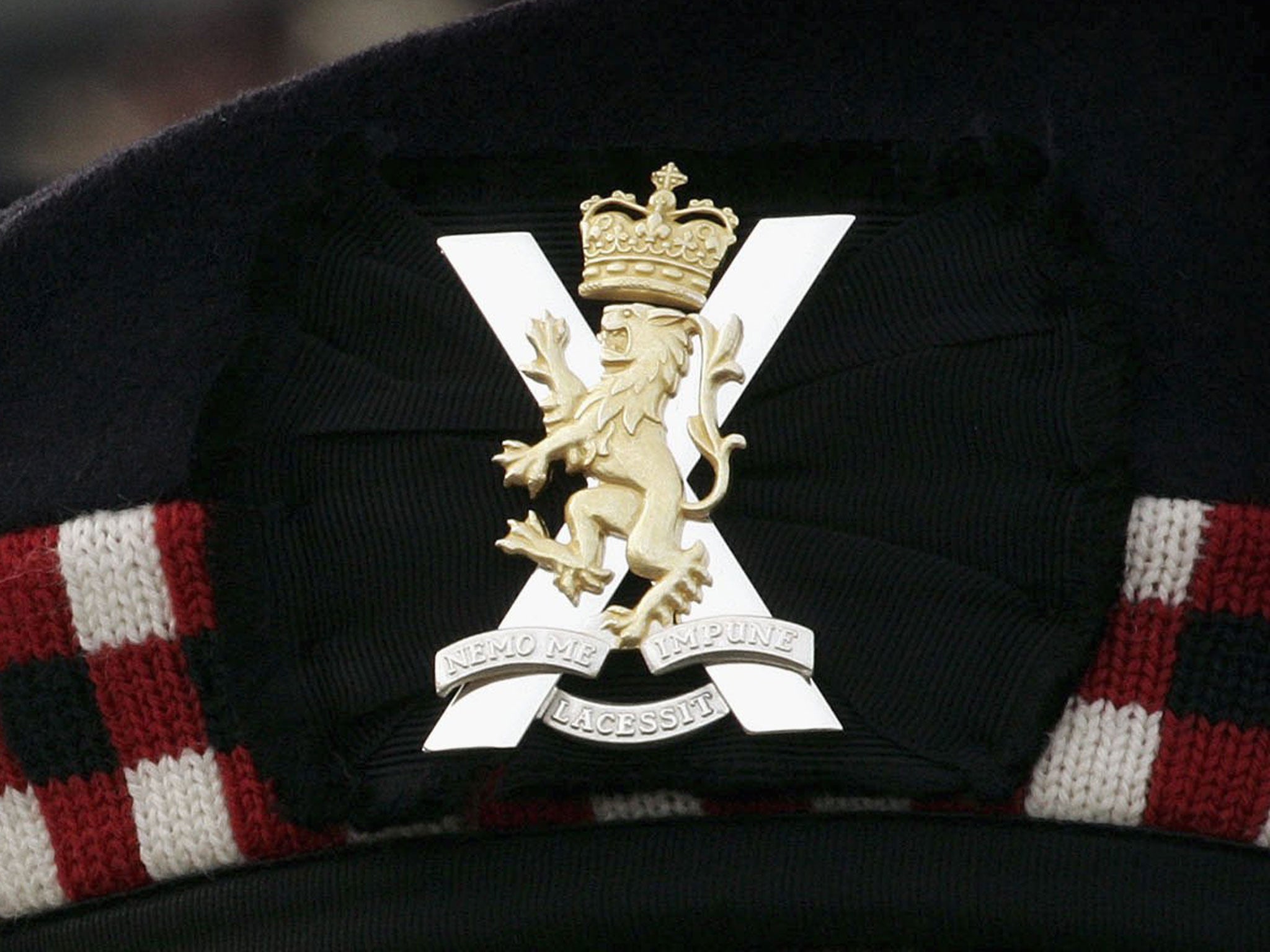A court in Manhattan heard that the Royal Regiment of Scotland soldiers allegedly punched an NYPD officer to the floor and continued hitting him as a friend attempted to stop them.