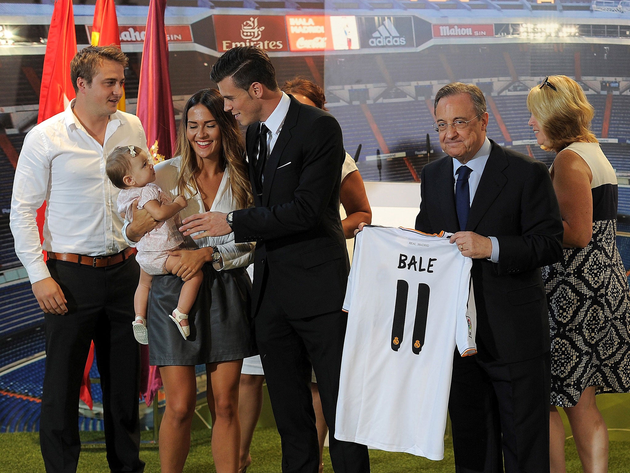 Gareth Bale, centre, was unveiled at the Santiago Bernabeu in Madrid by Real president Florentino Pérez, right