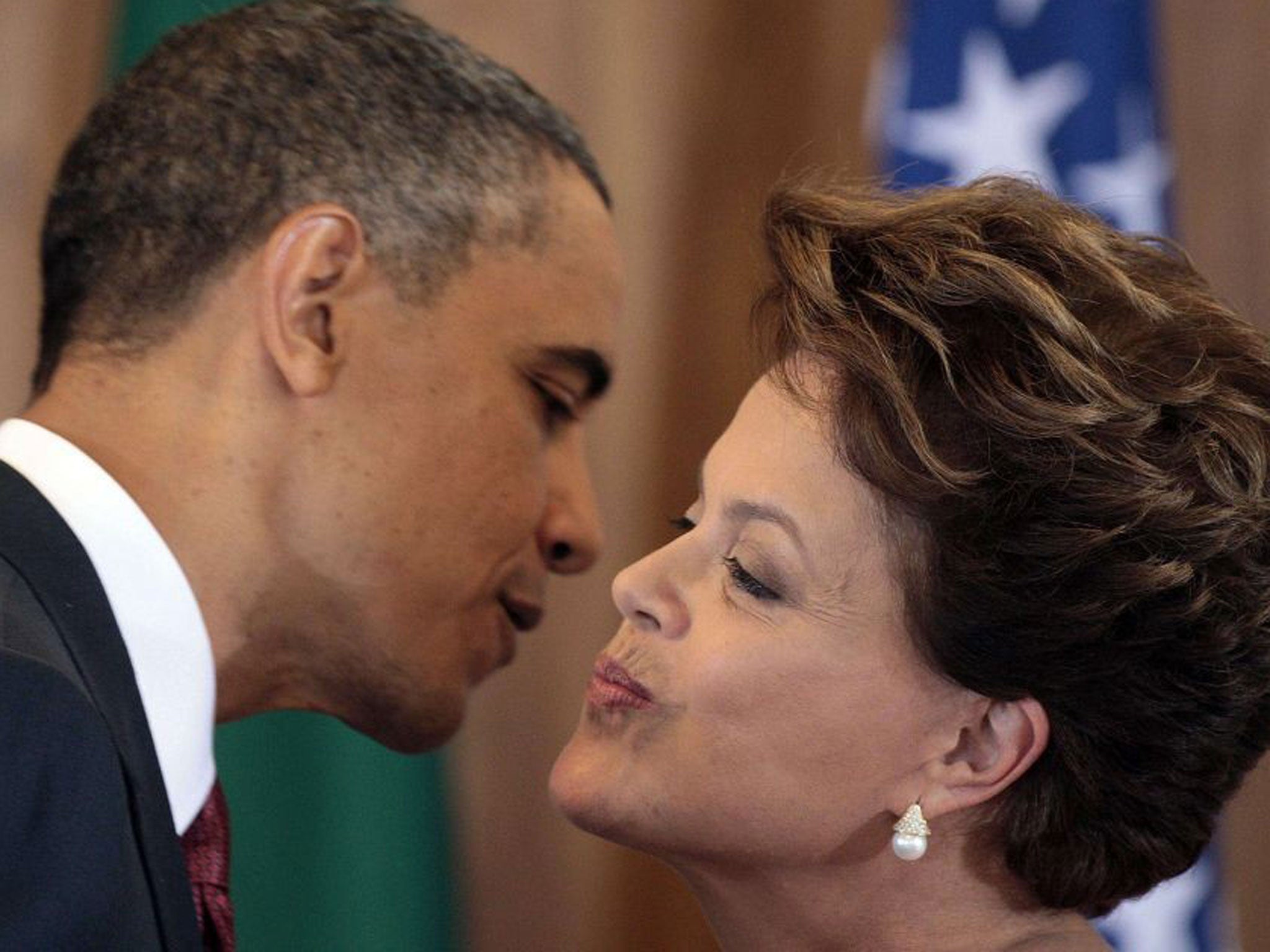 US President Barack Obama and Brazilian President Dilma Rousseff greet each other during a joint press conference at Planalto Palace in Brasilia, on March 19, 2011. The US ambassador to Brazil, Thomas Shannon, was summoned by authorities on 2 September 2013 over new allegations that the US National Security Agency spied on President Dilma Rousseff, an official said.