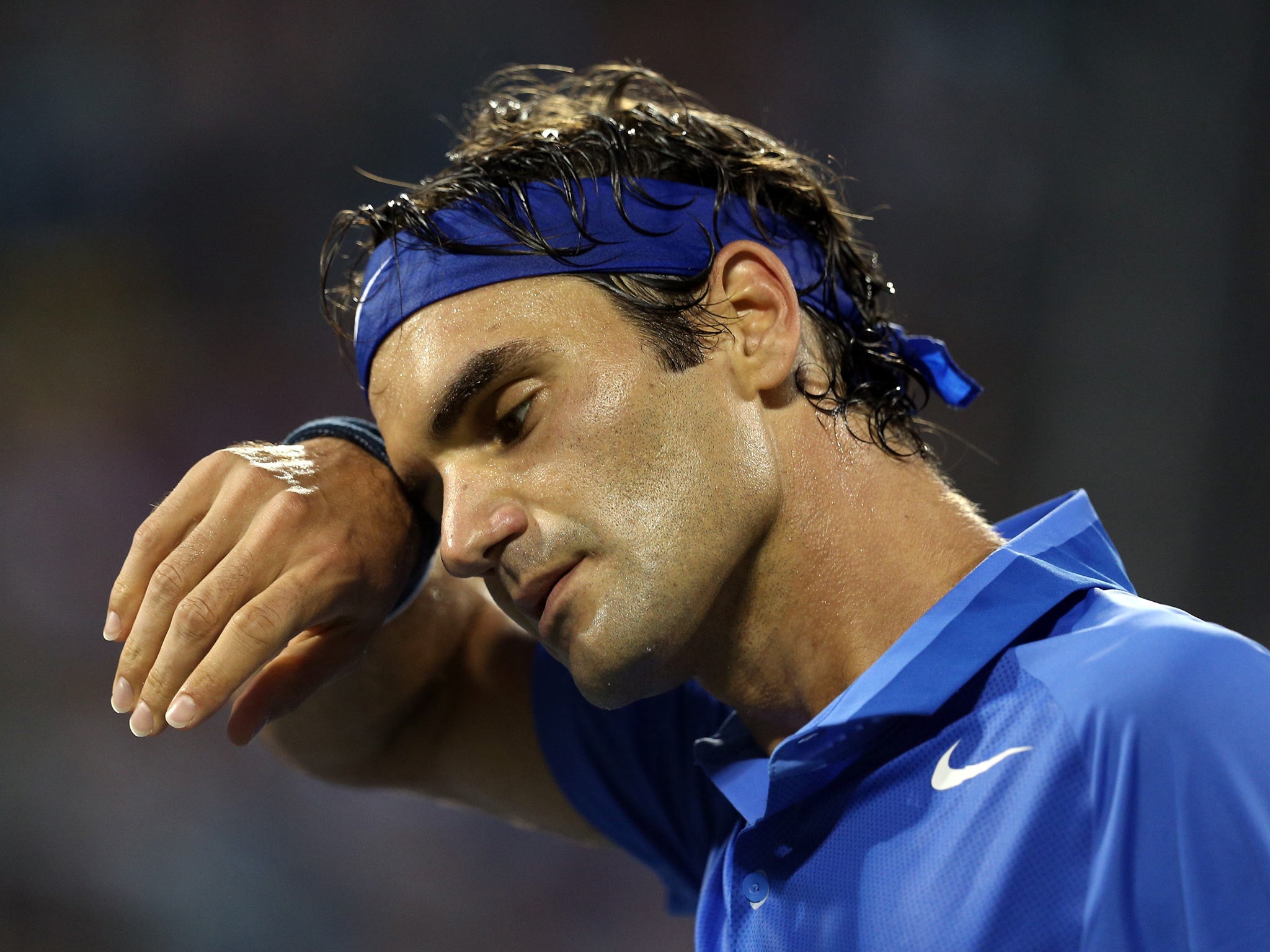 Roger Federer pictured in his defeat at the US Open