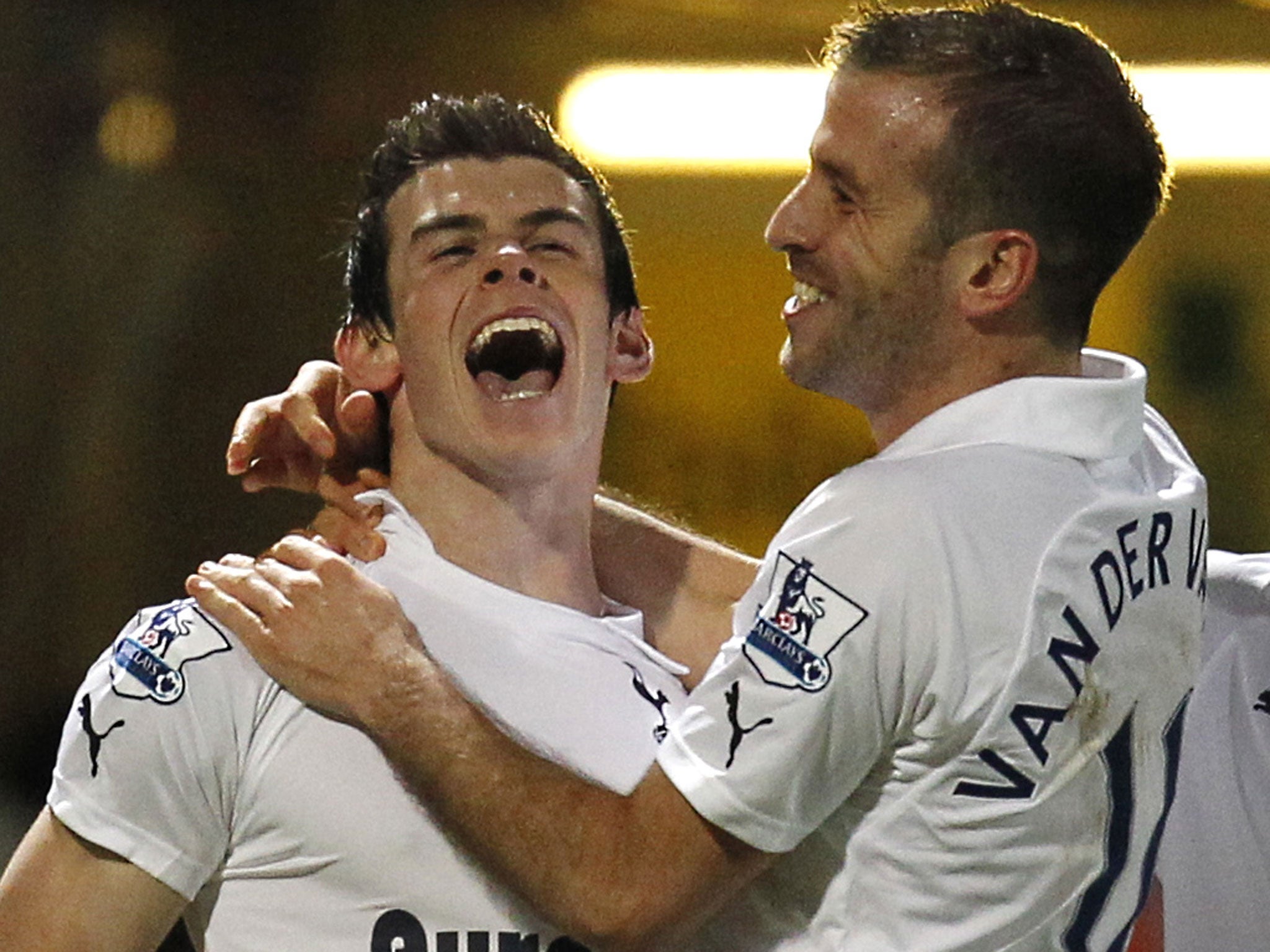 Rafael van der Vaart and Gareth Bale celebrate Bale's first of two goals in Spurs' 2-0 victory at Norwich City in December 2011