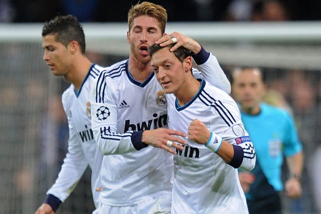 Sergio Ramos celebrates with Mesut Ozil