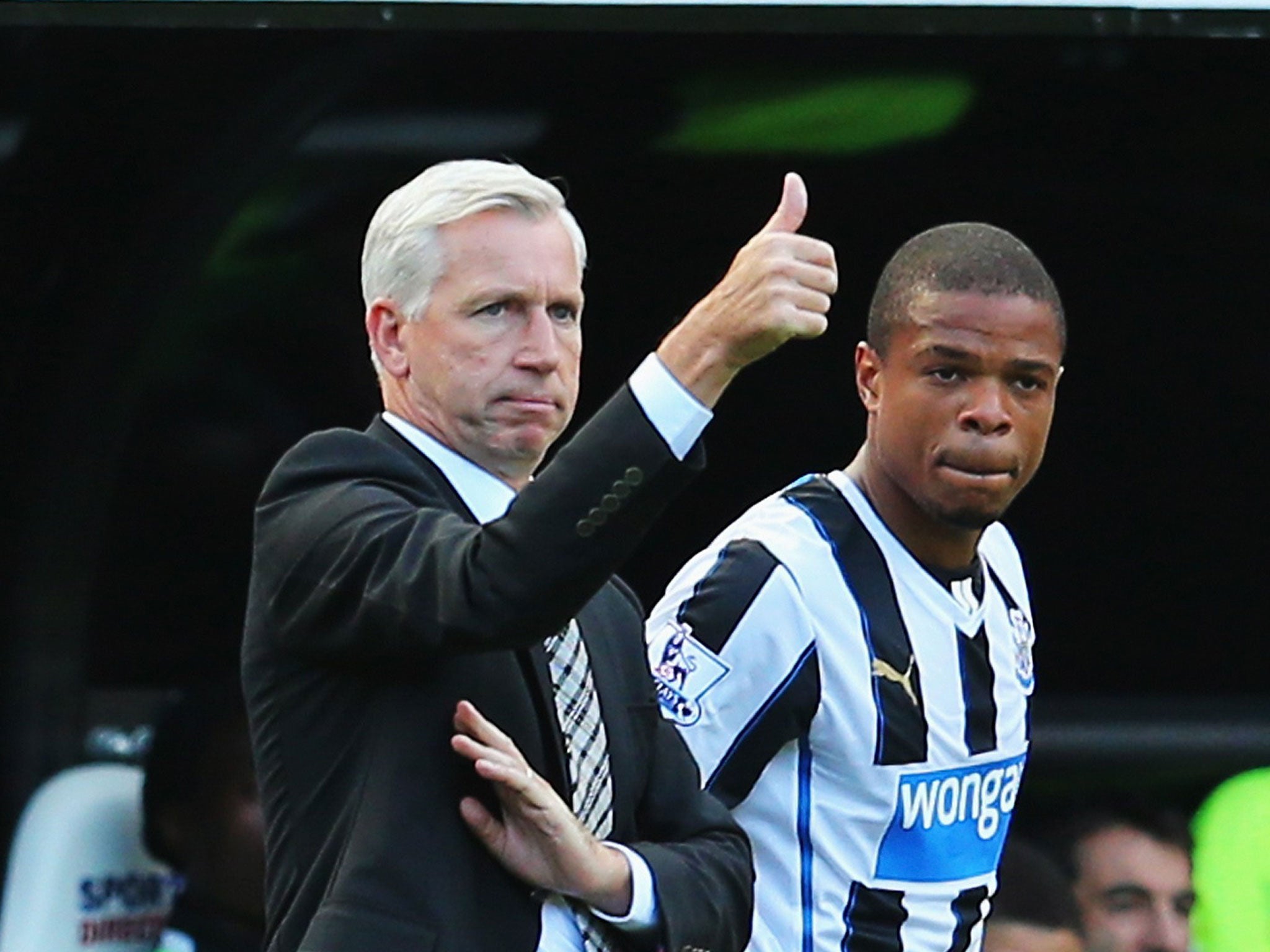 Alan Pardew (left) had to be content with Loïc Rémy (right) as his only major signing this summer
