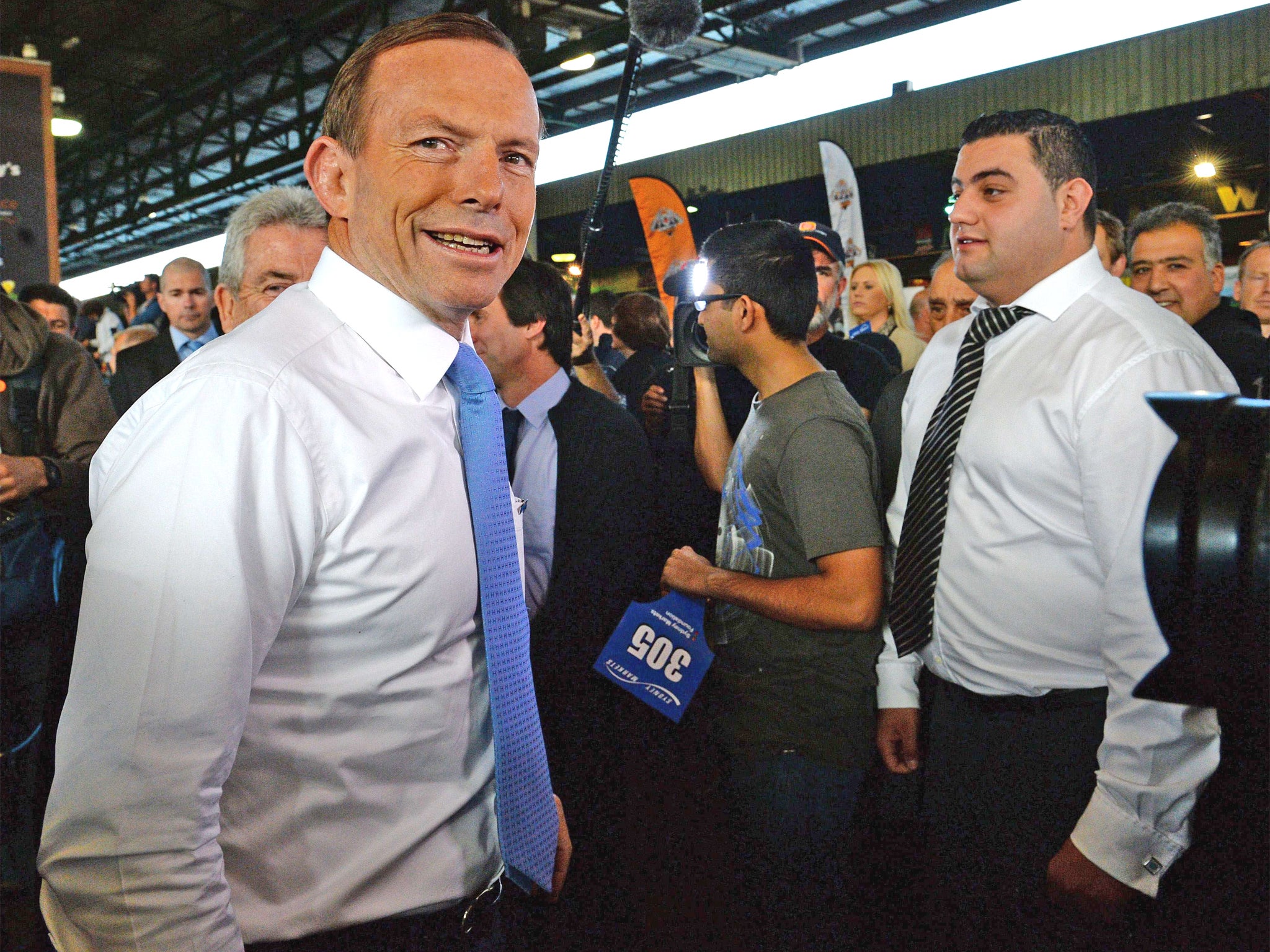 Tony Abbott meets traders in Flemington Market, west Sydney