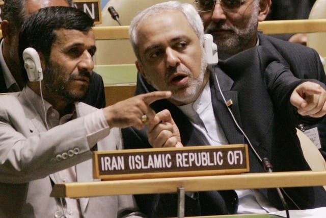 Mohammad Javad Zarif (right) with Mahmoud Ahmadinejad in 2006