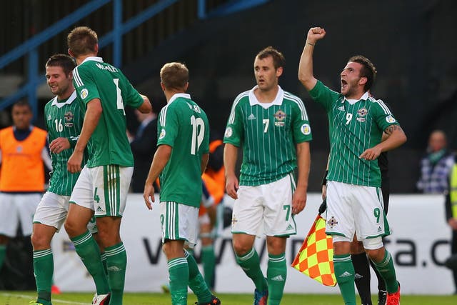 Martin Paterson celebrates for Northern Ireland after scoring against Russia