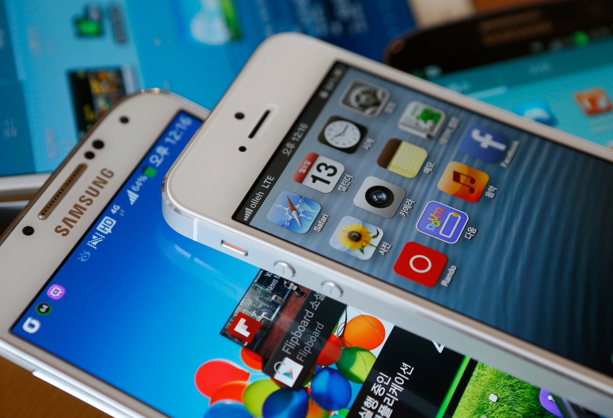 An iPhone 5 and Galaxy S4.