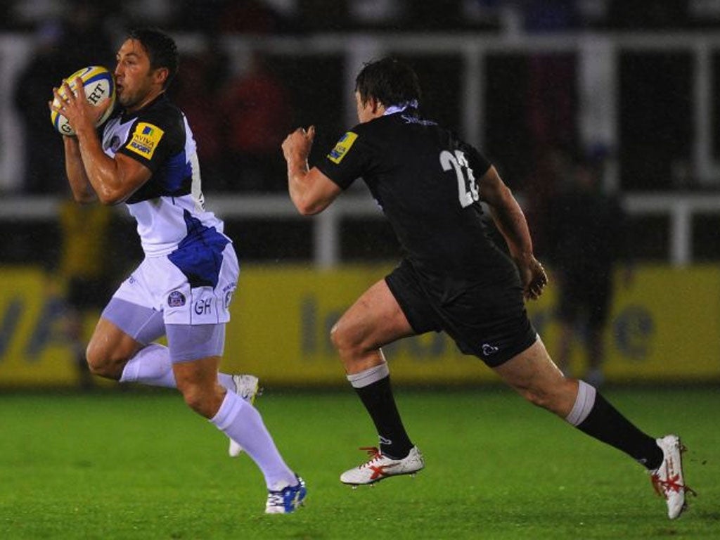 Bath’s Gavin Henson, who was booed by the home fans, sprints away from Adam Powell