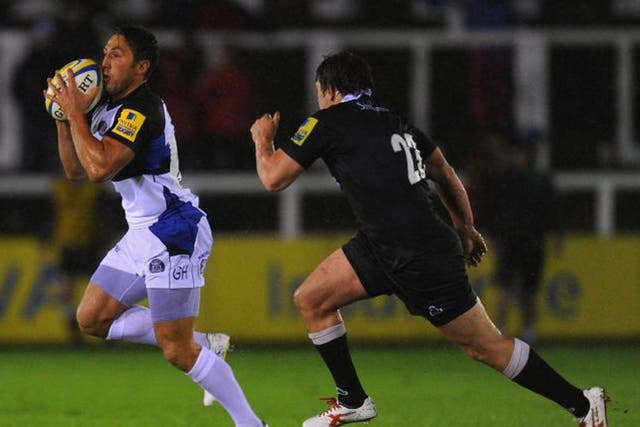 Bath’s Gavin Henson, who was booed by the home fans, sprints away from Adam Powell