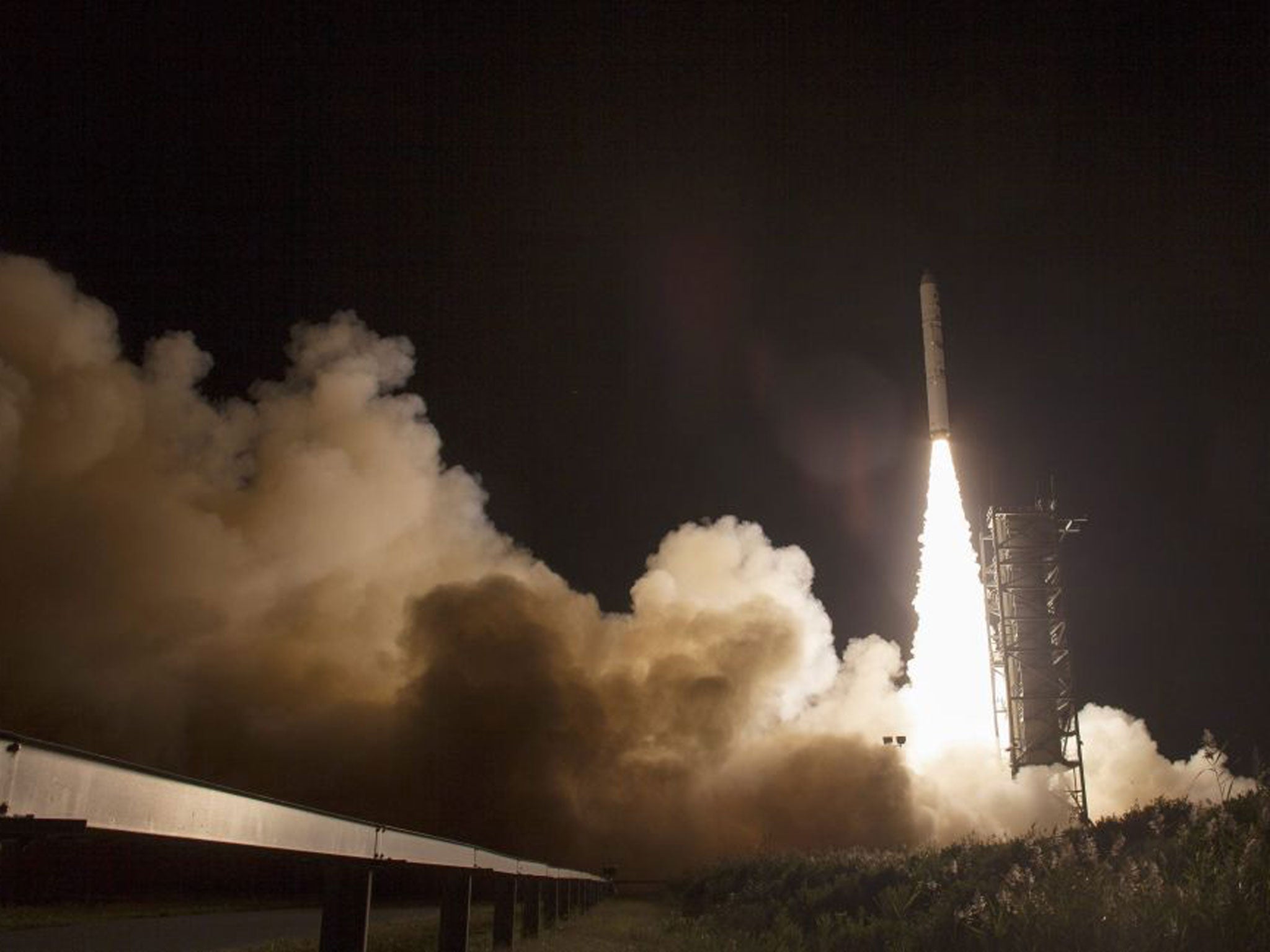 A Minotaur V rocket carrying NASA's Lunar Atmosphere and Dust Environment Explorer (LADEE) as it launches from the Mid-Atlantic Regional Spaceport (MARS) at NASA's Wallops Flight Facility in Virginia