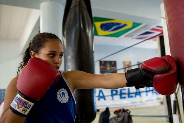 City of guns: a boxer trains at the Luta Pela Paz youth project
