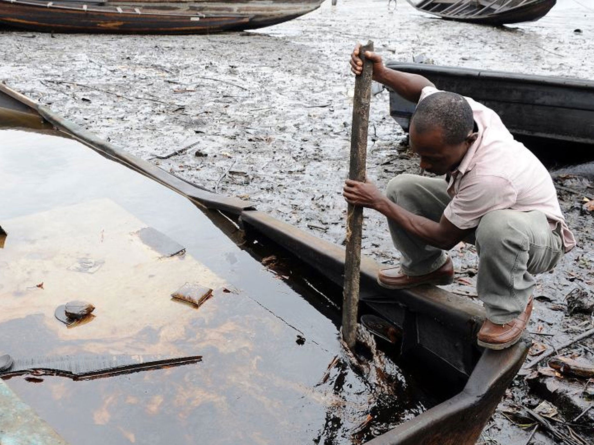 An oil-ravaged waterway in Ogoniland, Nigeria in 2011