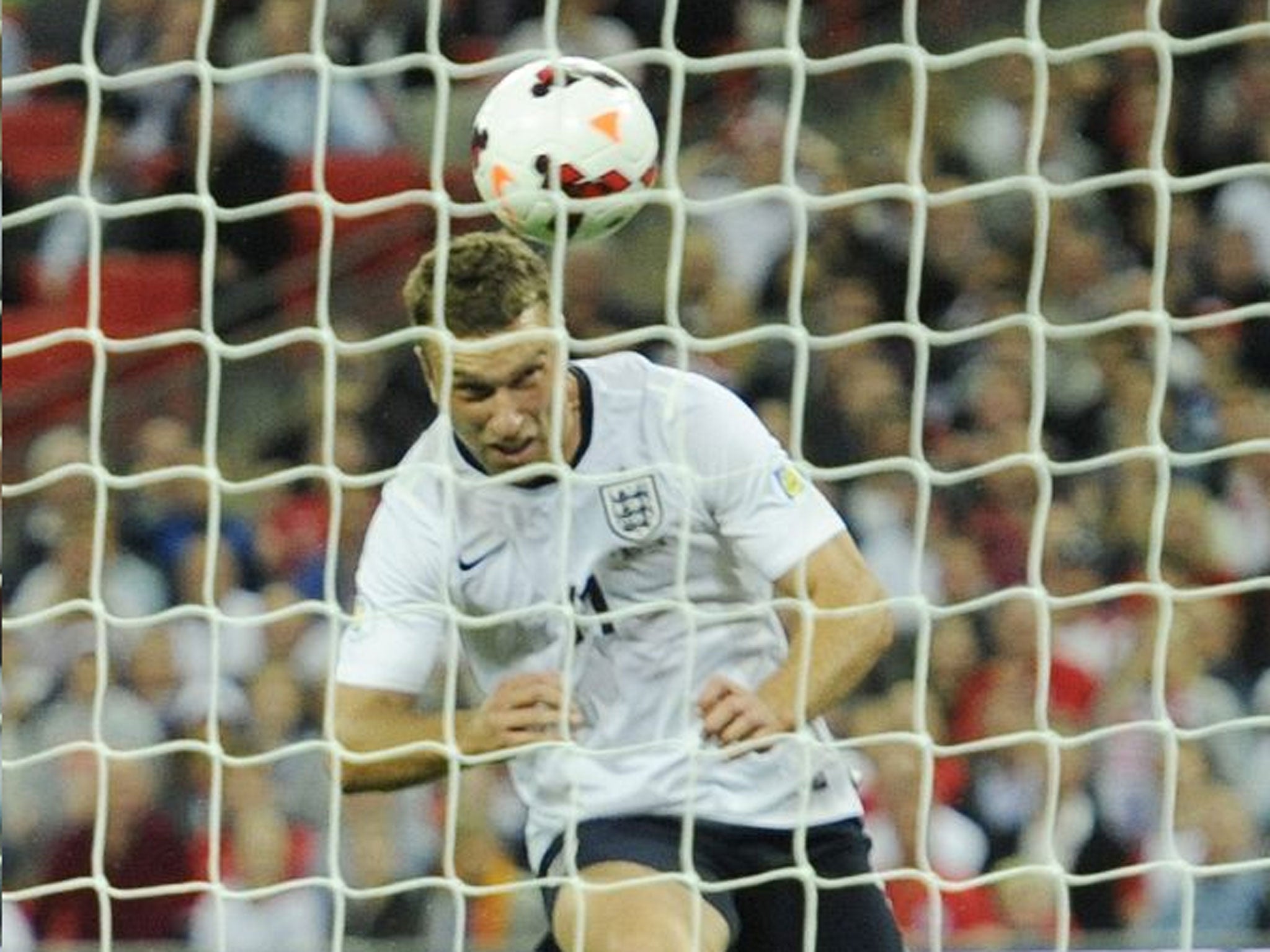 Net gain: Rickie Lambert heads home his goal against Moldova, his second in two games for England