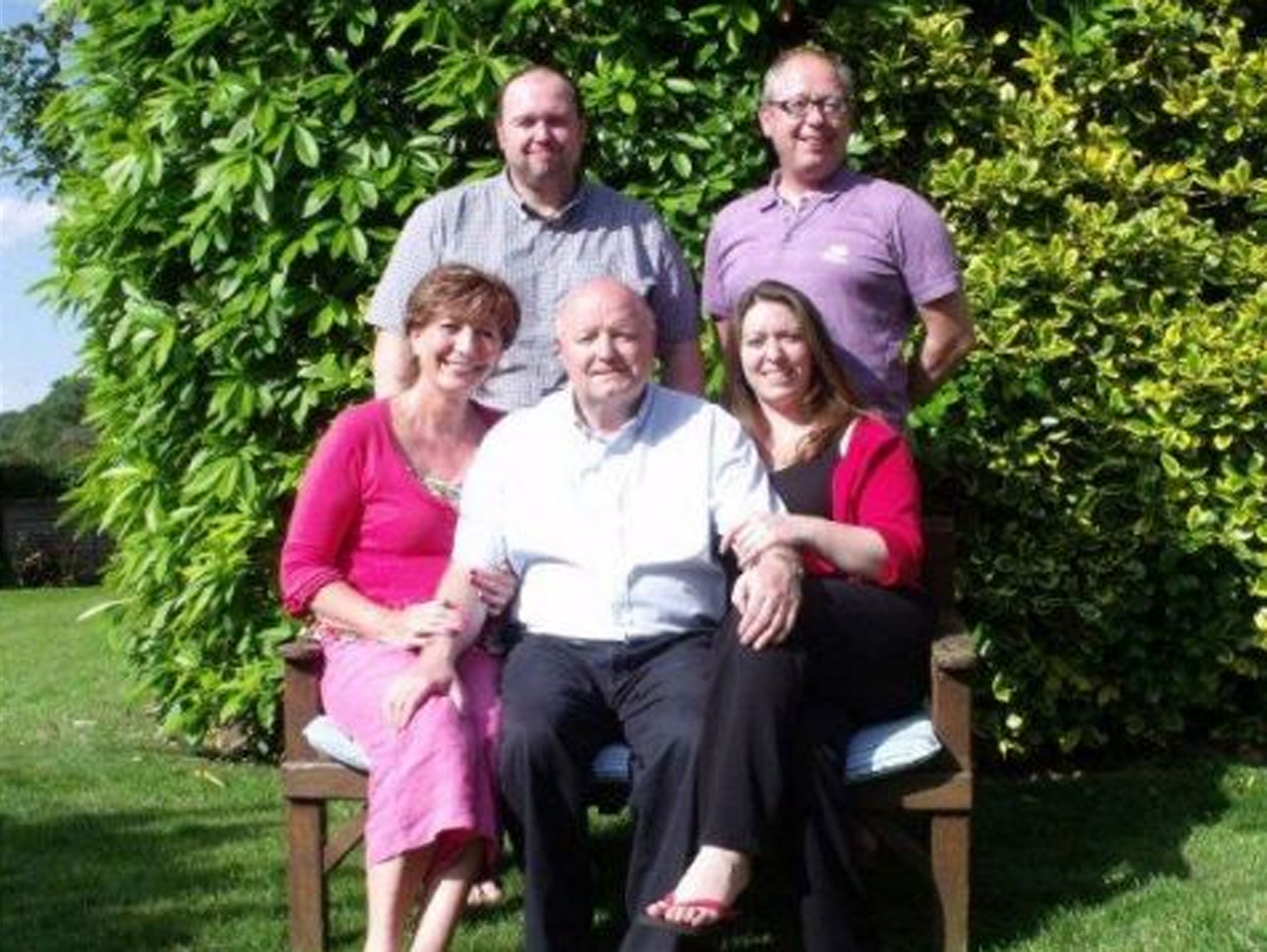 Support network: David Armstrong (centre) has emerged from a dark period with the backing of his family