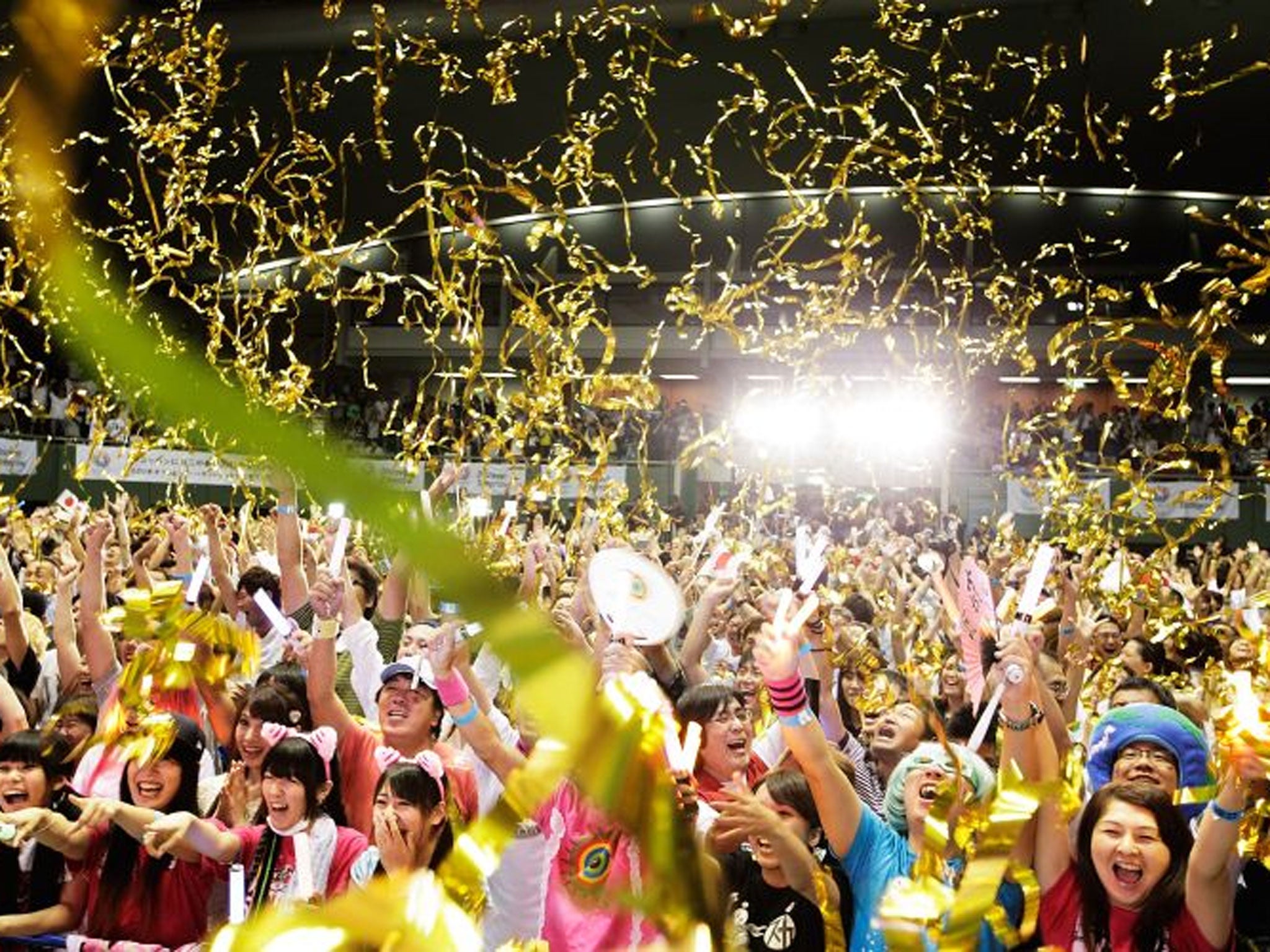 Residents of Olympic bid city Tokyo celebrate after the announcement of the 2020 Summer Olympic