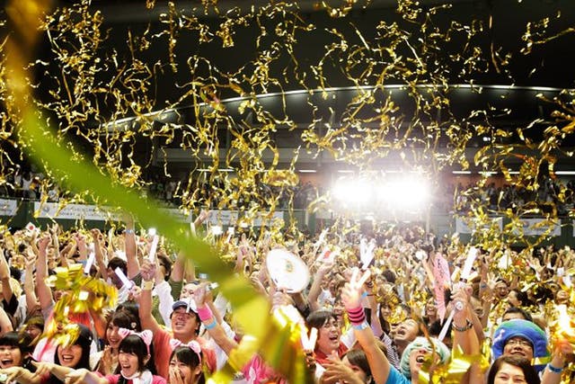 Residents of Olympic bid city Tokyo celebrate after the announcement of the 2020 Summer Olympic 