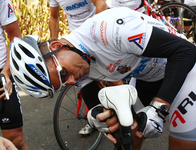 Abbott examines his seat after a nine-day pollie pedal cycle