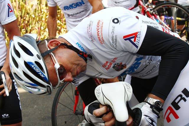 Abbott examines his seat after a nine-day pollie pedal cycle