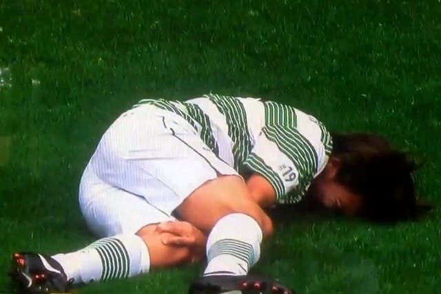 Louis Tomlinson lies injured during Stilyan Petrov's charity match