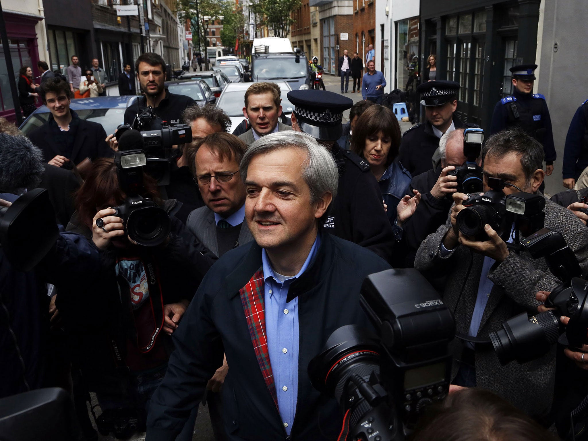 Chris Huhne speaks to the media as he arrives home after being released from prison on May 13, 2013 in Gloucester, England.