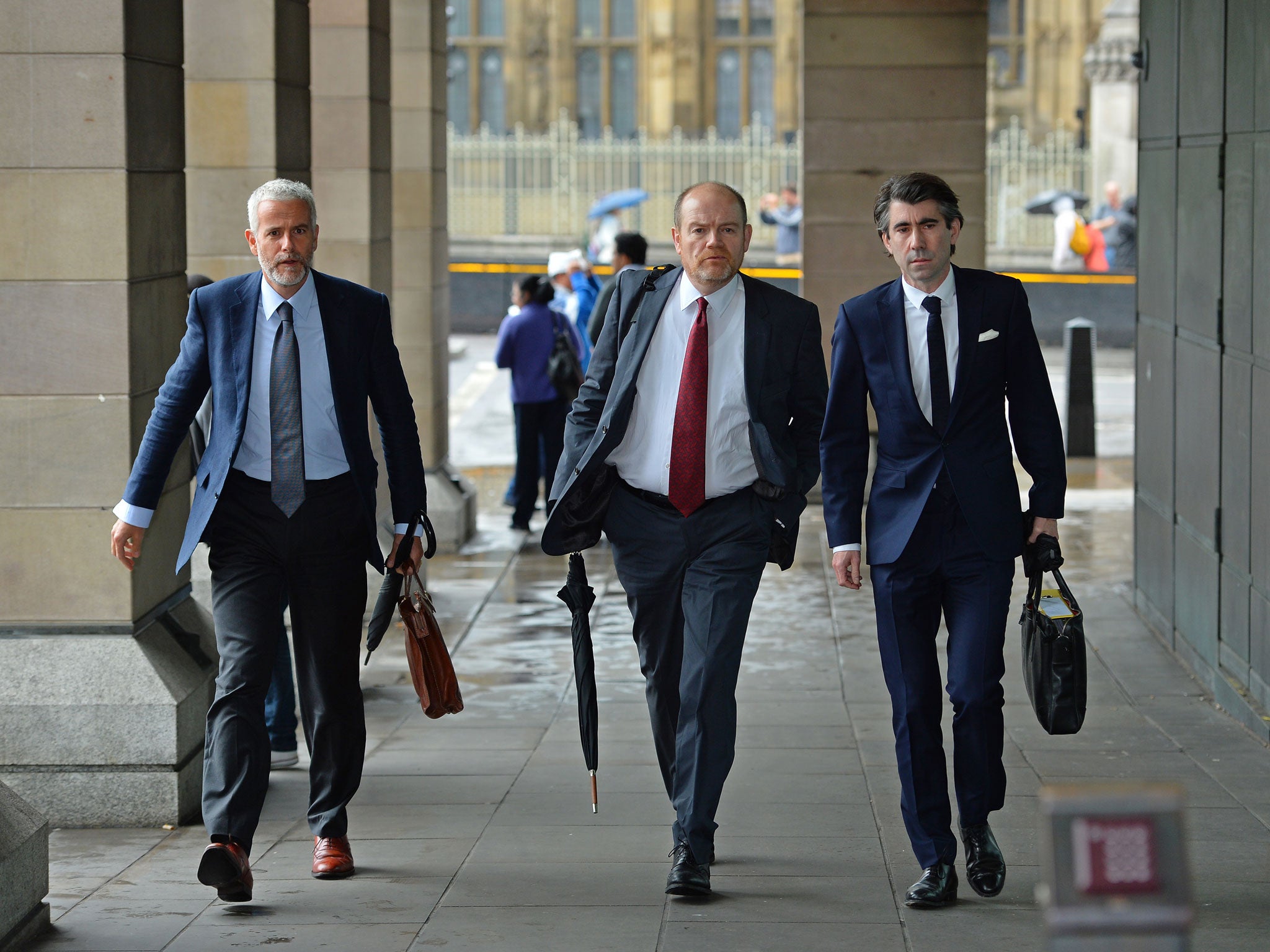 Former BBC director general Mark Thompson (C) arrives at the House of Commons in London on September 9, 2013.