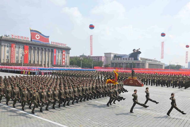 A parade of the Worker-Peasant Red Guards and a mass rally in Pyongyang in celebration of the 65th anniversary of North Korea