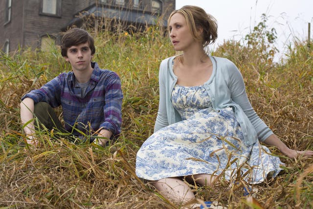 Too close for comfort: Freddie Highmore as Norman Bates and Vera Farmiga as his mother, Norma, in 'Bates Motel'