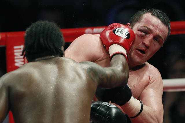 A suffering Denis Lebedev on the end of another punishing blow from Guillermo Jones in May