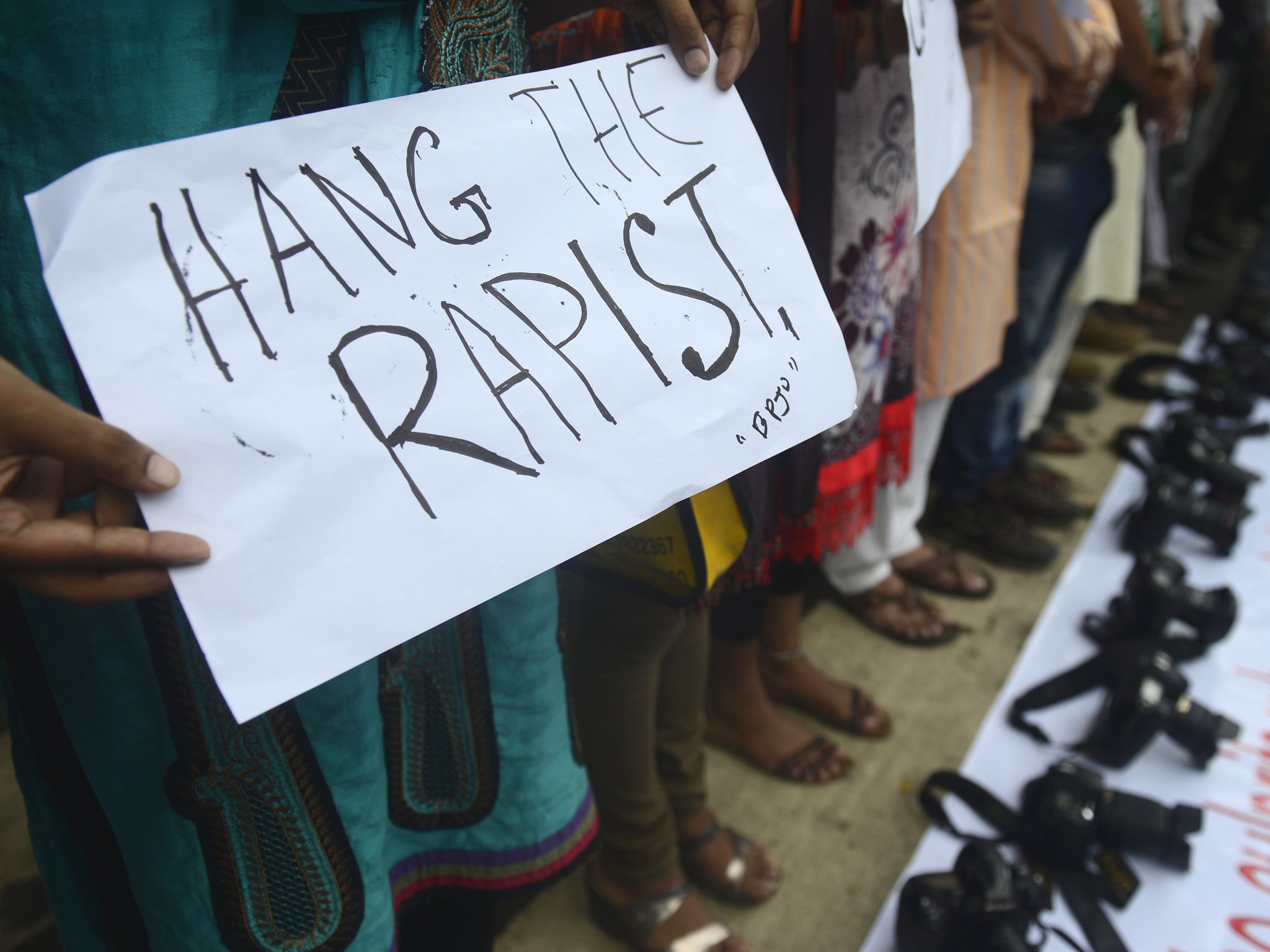 Bangladeshi photojournalists and social activists form a human chain in Dhaka as they protest the gang-rape of a female colleague in Mumbai, India