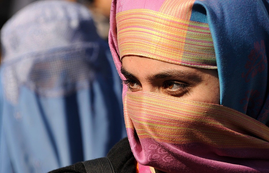 A woman wears an Islamic niqab veil