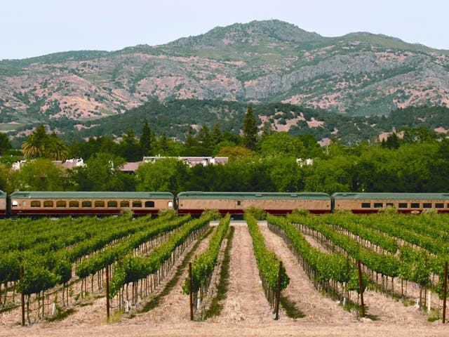 Vine time: a train passes through a Napa Valley vineyard