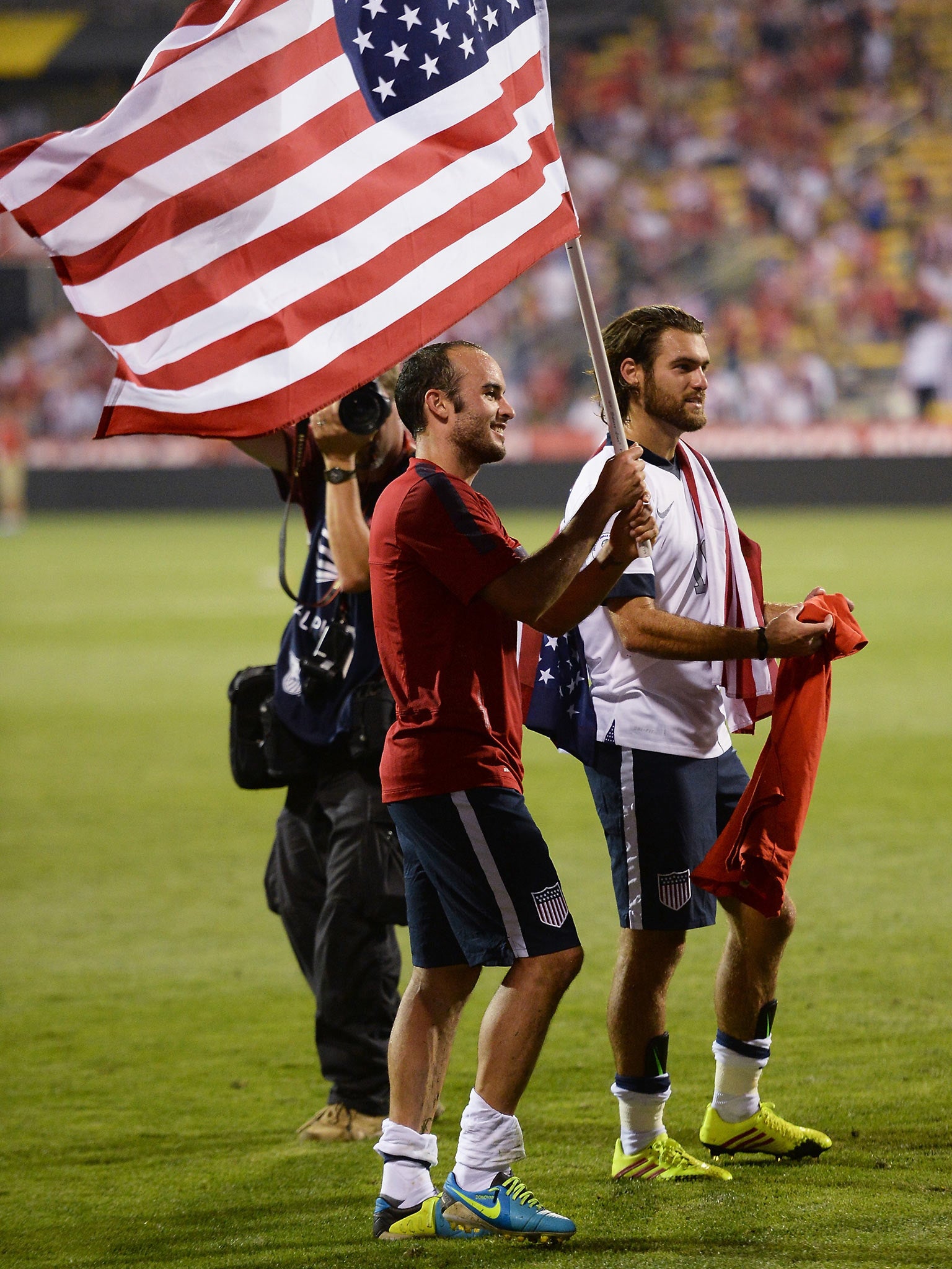 Landon Donovan celebrates after the US qualify for the World Cup