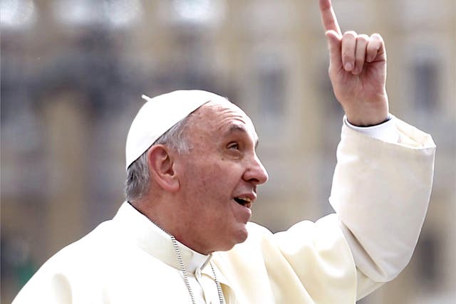 Pope Francis gestures upon his arrival in St Peter's square