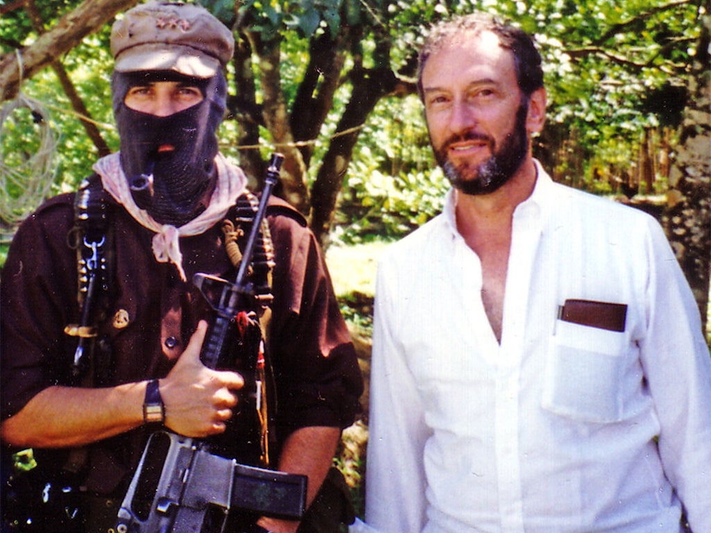 Saul Landau with a Mexican Zapatista