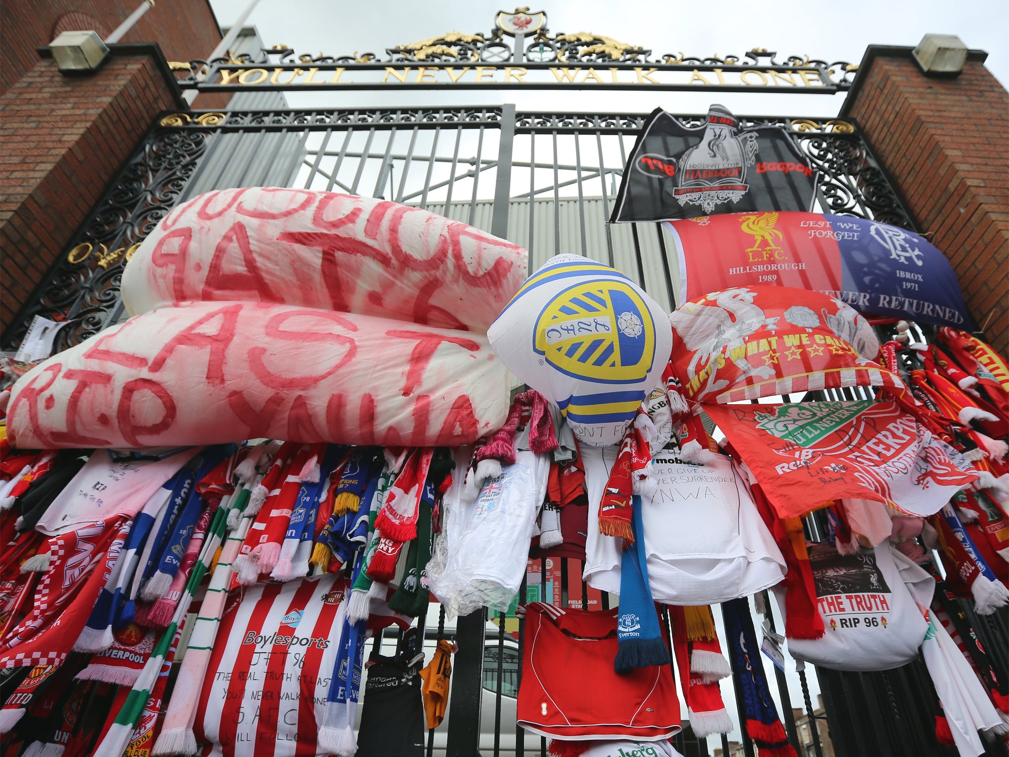 Tributes at Anfield’s Shankly Gates following the publication of the Hillsborough report last year