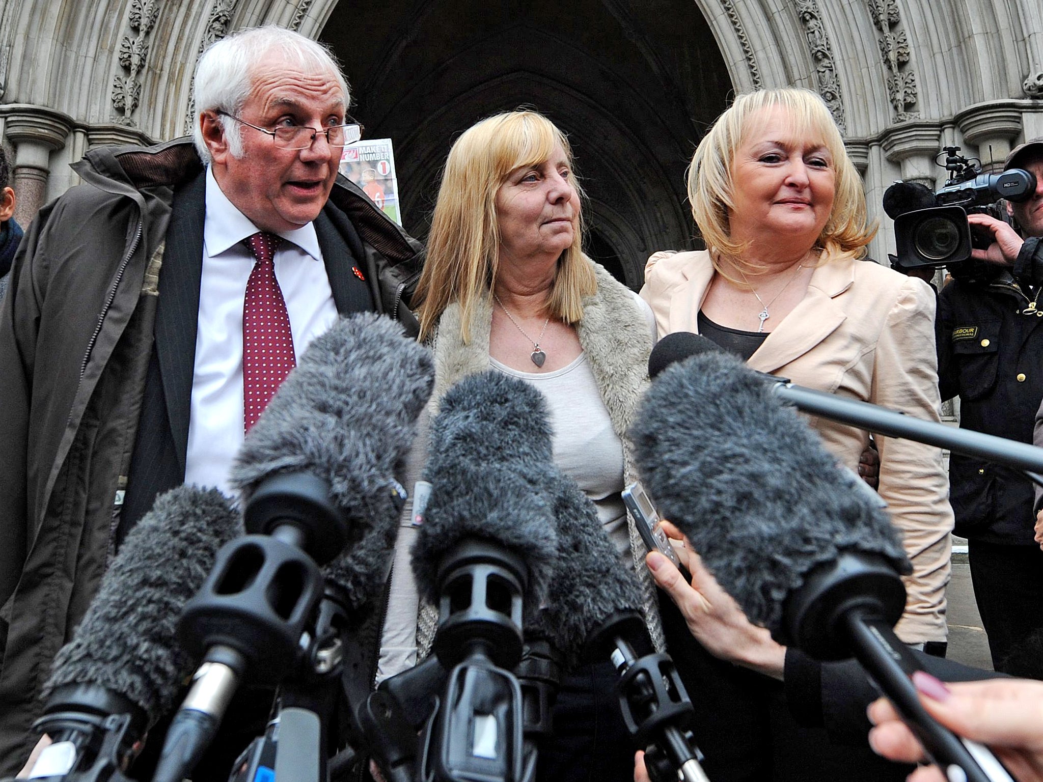 Members of the Hillsborough Family Support Group outside the High Court in 2012. (Left to right) Trevor Hicks, Margaret Aspinall and Jenni Hicks (EPA)