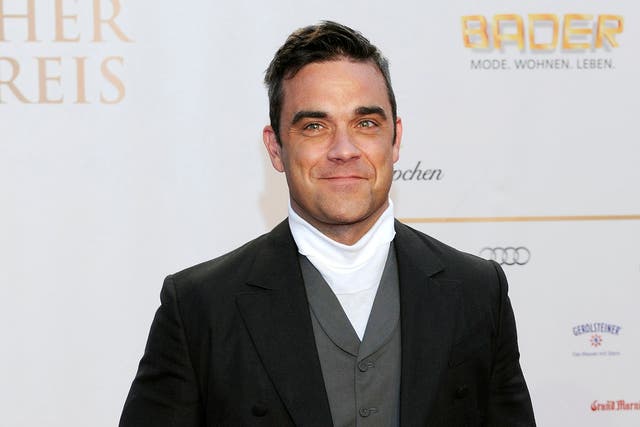 Robbie Williams is to release a new album called Swing Both Ways