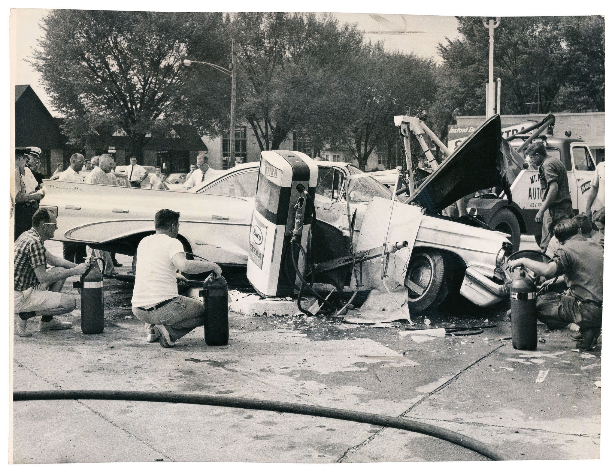 The images tell a specific story of whatever dramatic, newsworthy event was unfolding: oil shortages, a tornado, a car crash, flooding