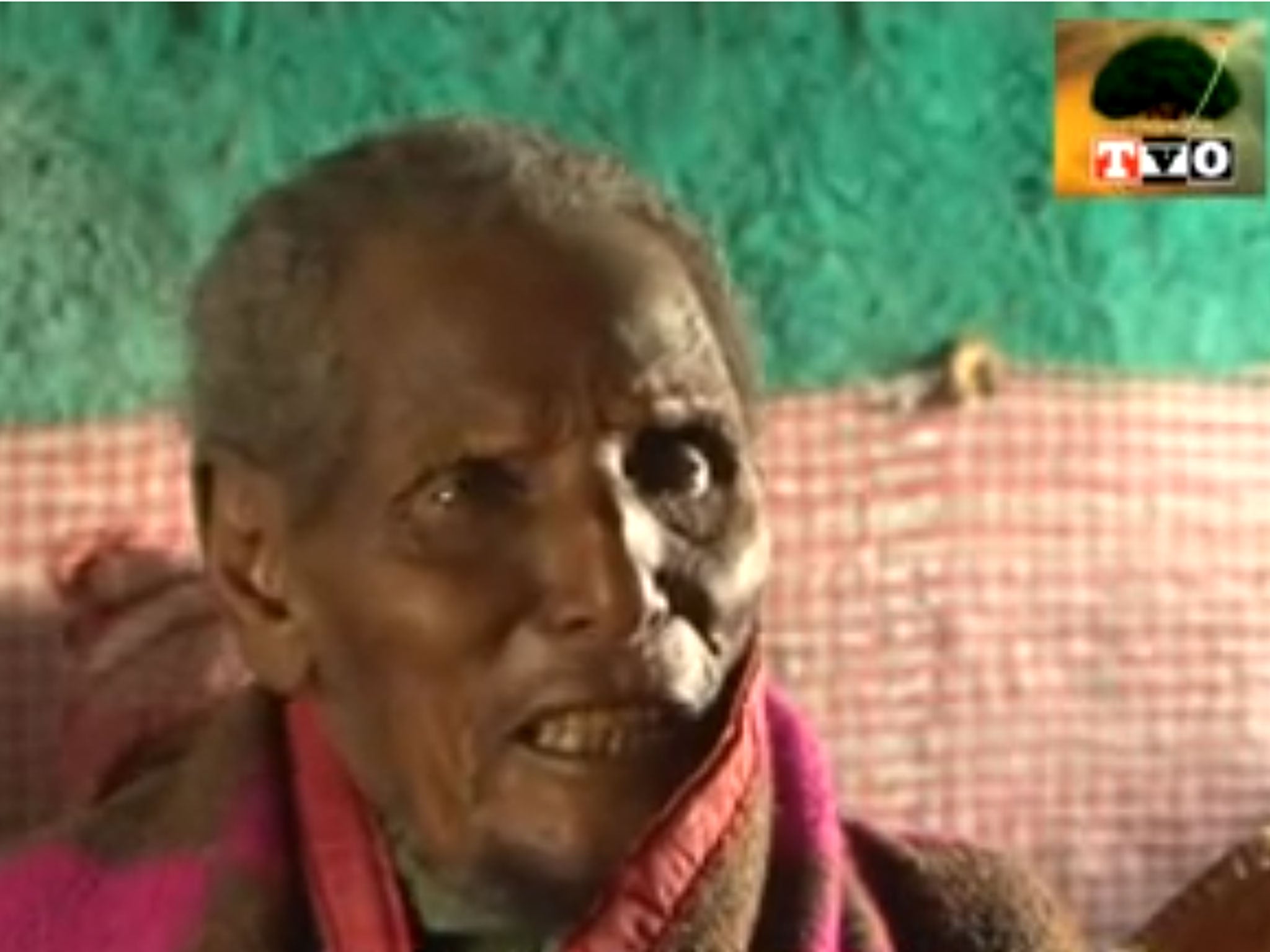 Dhaqabo Ebba, pictured here telling TV reporters his memories of events in the 19th Century, could be the oldest man ever to have lived at 160 years old