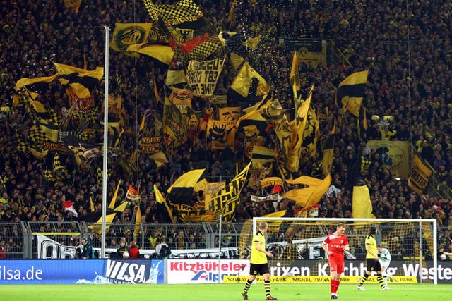 Many Bundesliga grounds, such as Borussia Dortmund’s Westfalenstadion, feature flip up rail seats on their terraces